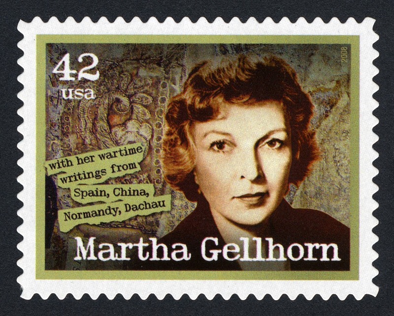Color image of a USA postage stamp (42 cents) featuring Martha Gellhorn's face and name.  In typewriter font on green, additional text reads "with her wartime writings from Spain, China, Normandy, Dachau."