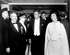 President and Mrs. Kennedy arrive at National Guard Armory for Inaugural Ball, 20 January 1961.