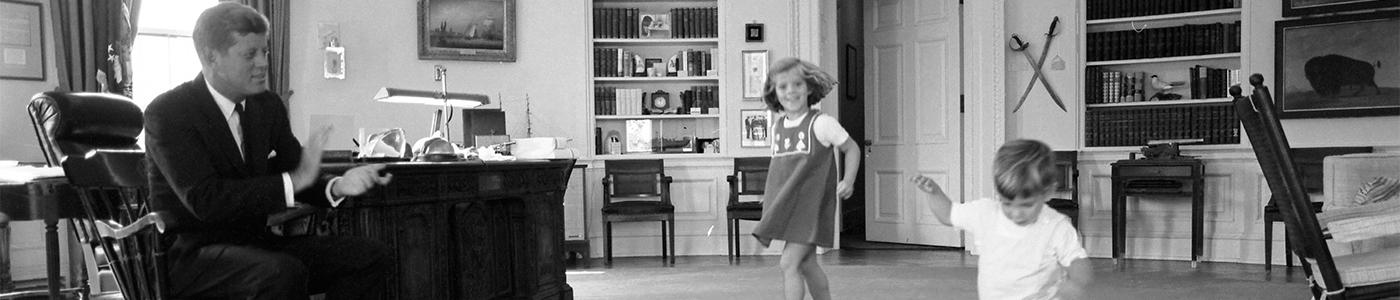 ST-441-10-62. President John F. Kennedy Watches Children Dance in Oval Office